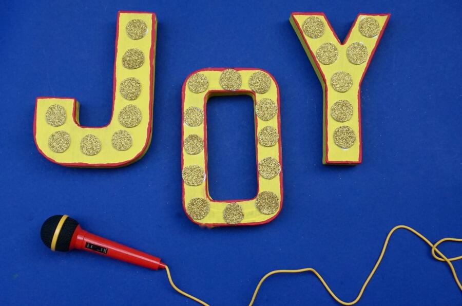 DIY: Celebrate 'Sing' with This Sparkling Sign