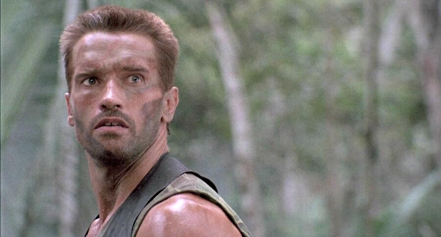 Watch Arnold Schwarzenegger Pump Iron and Tease His 'Predator' Return