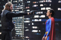 A gun-wielding thug (Paul Zies) takes aim at "Super hero" (Adam Campbell) in "Epic Movie."