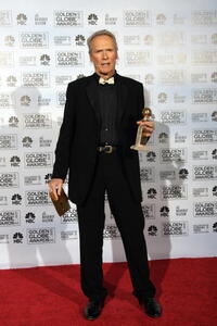 Clint Eastwood holds his award for Best Director of a Foreign Language Film at the 12th Annual Critics' Choice Awards 