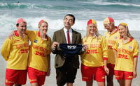 Actor Rowan Atkinson with Life Savers at Bondi Beach in Australia to promote "Mr. Bean's Holiday." 