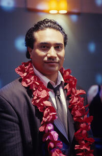 Stanley (Iaheto Ah Hi) at a wedding reception in "Samoan Wedding."