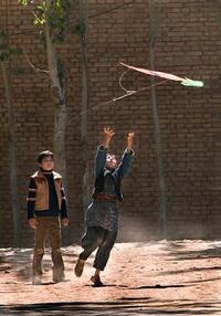 Zekiria Ebrahimi as young Amir and Ahmad Khan Mahmoodzada as young Hassan star in "The Kite Runner".