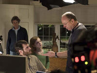 Joaquin Phoenix, Elle Fanning and director Terry George on the set of "Reservation Road."