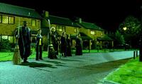 George Harris as Kingsley Shacklebolt, Daniel Radcliffe, Brendan Gleeson, Natalia Tena, Bridgette Millar as Emmeline Vance and Peter Cartwright as Elphias Doge in "Harry Potter and the Order of the Phoenix."