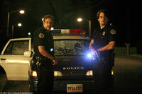 Two clueless cops, Officer Slater (Bill Hader) and Officer Michaels (Seth Rogen) in "Superbad."