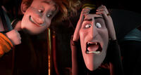 Johnnystein voiced by Andy Samberg and Dracula voiced by Adam Sandler in "Hotel Transylvania."