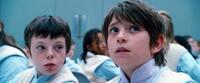 Charlie Rowe and Ben Walker in "The Golden Compass."