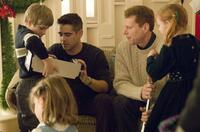 Colin Farrell as Jimmy Egan, Noah Emmerich as Francis Tierney, Jr. with children (Ty Simpkins and Ryan Simpkins) in "Pride and Glory."