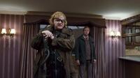 Brendan Gleeson as Alastor 'Mad Eye' Moody and Mark Williams as Arthur Weasley in "Harry Potter and the Deathly Hallows - Part 1."