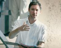 Director Kevin Macdonald on the set of "My Enemy's Enemy."