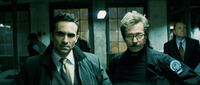Nestor Carbonell and Gary Oldman in "The Dark Knight."