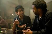 Cyril Takayama as Jimmy Sakata and Chiwetel Ejiofor as Mike Terry in "Redbelt."
