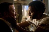 Tim Allen as Chet Frank and Chiwetel Ejiofor as Mike Terry in "Redbelt."