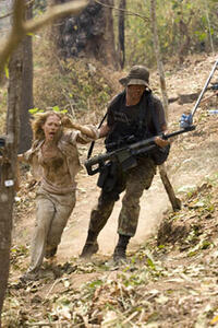 Sarah (Julie Benz) and Schoolboy (Matthew Marsden) in "Rambo."