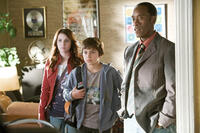 Emma Roberts, Jake T. Austin and Don Cheadle in "Hotel for Dogs."