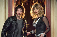 Kevin Dillon and Lisa Kudrow in "Hotel for Dogs."
