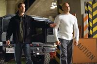 Paul Walker as Brian O'Conner and Vin Diesel as Dom Toretto in "Fast & Furious."