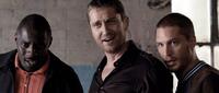 Idris Elba as Mumbles, Gerard Butler as One Two and Tom Hardy as Handsome Bob in "RocknRolla."