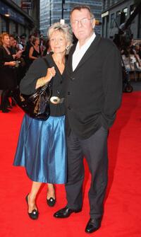 Tom Wilkinson and Guest at the UK premiere of "RocknRolla."