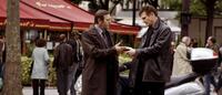 Liam Neeson as Bryan Mills and Olivier Rabourdin as Jean Claude in "Taken."