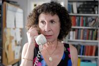 Rhea Perlman as Reisele in "Love Comes Lately."