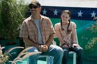 Kevin Costner and Madeline Carroll in "Swing Vote."