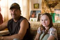 Kevin Costner and Madeline Carroll in "Swing Vote."