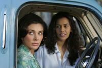 Lisa Ray as Miriam and Sheetal Sheth as Amina in "The World Unseen."