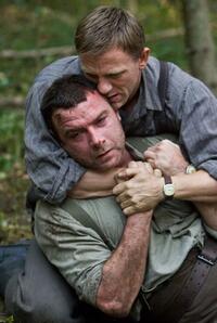 Daniel Craig as Tuvia Bielski and Liev Schreiber as Zus Bielski in "Defiance."