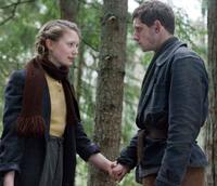 Mia Wasikowska as Chaya and Jamie Bell as Assael in "Defiance."