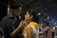 Dev Patel as Jamal and Freida Pinto as Latika in "Slumdog Millionaire."