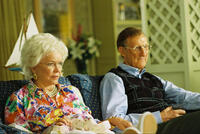 Ellen Burstyn as Barbara Bush and James Cromwell as George H. W. Bush in "W."