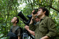 Camera assistant Ed Anderson, photographer Bill Wallauer and director Mark Linfield on the set of "Chimpanzee."