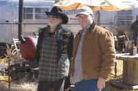 Willie Nelson as Charlie and Rodney Carrington as Lonnie in "Beer for My Horses."