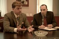 Matt Damon as Mark Whitacre and Tony Hale as James Epstein in "The Informant!"