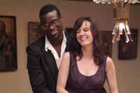 Tunde Adebimpe as Sidney and Rosemarie DeWitt as Rachel in "Rachel Getting Married."