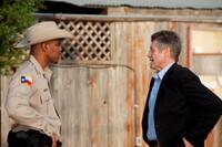 Asante Jones as Sheriff Tom Jasper and Fred Ward as Sergeant Archie Sparks in "Exit Speed."