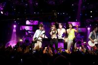 Nick Jonas, Demi Lovato, Joe Jonas and Kevin Jonas in "Jonas Brothers: The 3D Concert Experience."