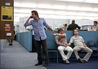 Bradley Cooper as Phil, Zach Galifianakis as Alan and Ed Helms as Stu in "The Hangover."