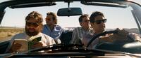 Zach Galifianakis as Alan, Bradley Cooper as Phil, Ed Helms as Stu and Justin Bartha as Doug in "The Hangover."