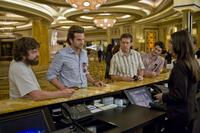 Zach Galifianakis as Alan, Bradley Cooper as Phil, Ed Helms as Stu and Justin Bartha as Doug in "The Hangover."