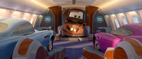 Finn McMissile voiced by Michael Caine, Mater voiced by Larry the Cable Guy, Holley Shiftwell voiced by Emily Mortimer in "Cars 2."