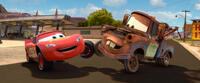 Lightning McQueen voiced by Owen Wilson and Mater voiced by Larry the Cable Guy in "Cars 2."