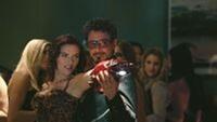 Scarlett Johansson as Natasha Romanoff and Robert Downey Jr. as billionaire industrialist Tony Stark in "Iron Man 2."