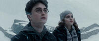Daniel Radcliffe as Harry Potter and Emma Watson as Hermione Granger in Harry Potter and The Half-Blood Prince." 
