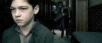 Hero Fiennes Tiffin as a young Tom Riddle, Amelda Brown as Mrs. Cole and Michael Gambon as Albus Dumbledore in "Harry Potter and the Half-Blood Prince."