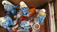 Grouchy, Gutsy, Brainy, Papa and Smurfette Smurf in "Smurfs."