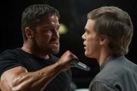 Gerard Butler as Kable and Michael C. Hall as Ken Castle in "Gamer."
