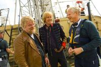 Philip Seymour Hoffman, Rhys Ifans and director Richard Curtis on the set of "Pirate Radio."